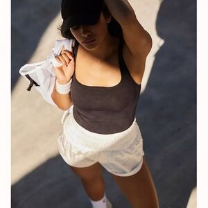 NWOT Free People Movement Good Karma Long Tank size M/L Washed Black